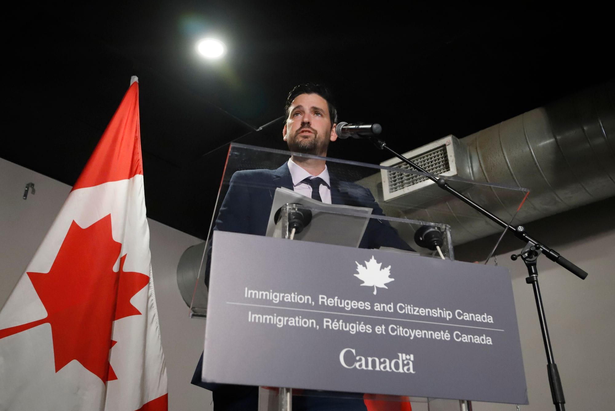 A photo of Minister of Immigration, Refugees and Citizenship Sean Fraser at a press conference in October.