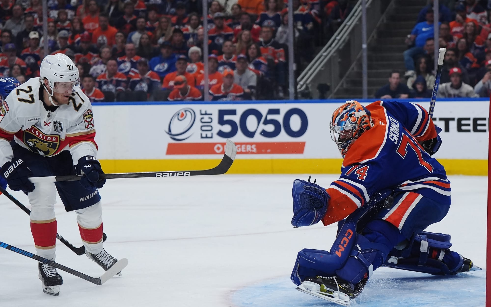 The Edmonton Oilers Community Foundation 50/50 logo is shown on the boards at Rogers Place in Edmonton