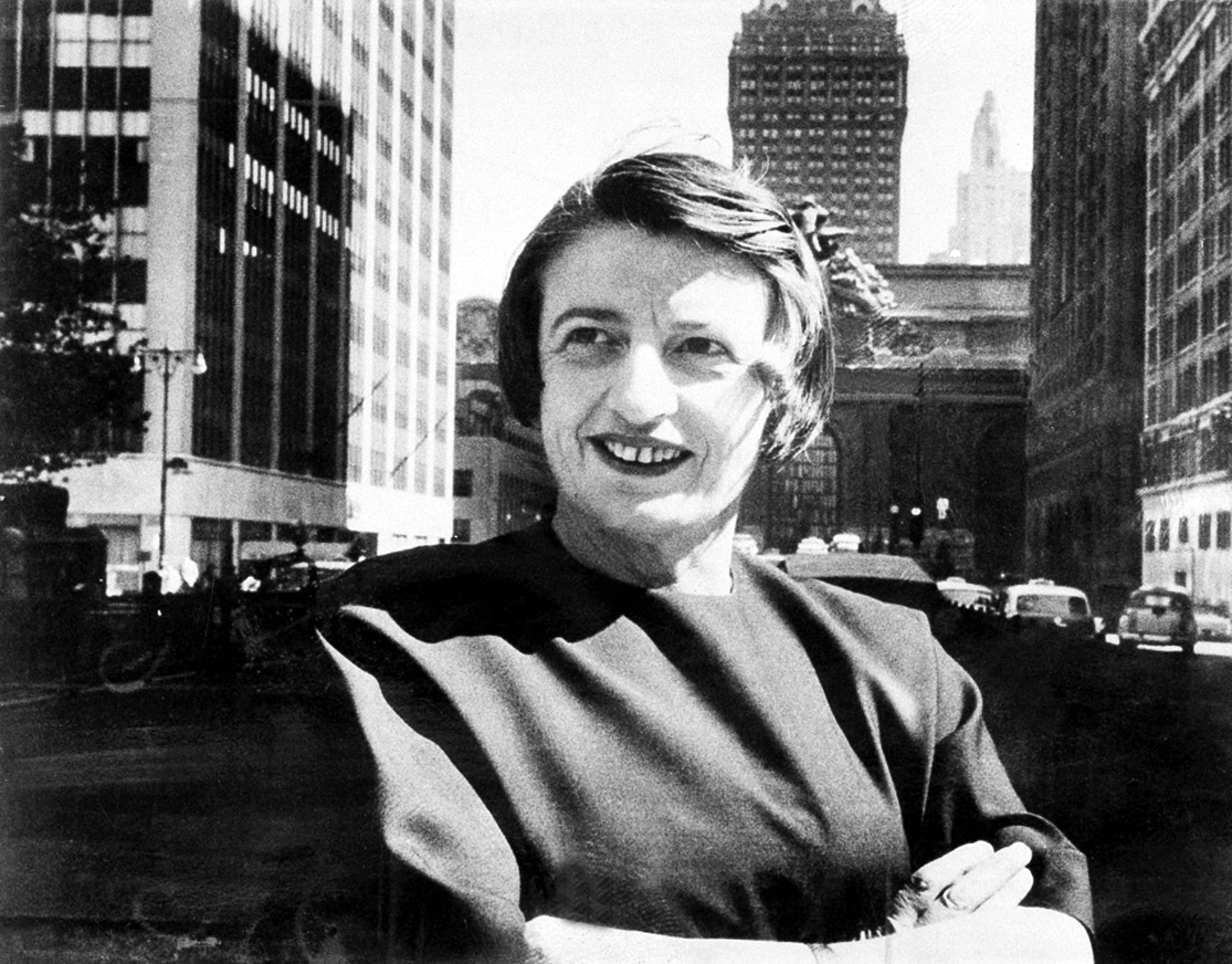 A black and white 1962 file photo shows Ayn Rand in New York with Grand Central Terminal in the background