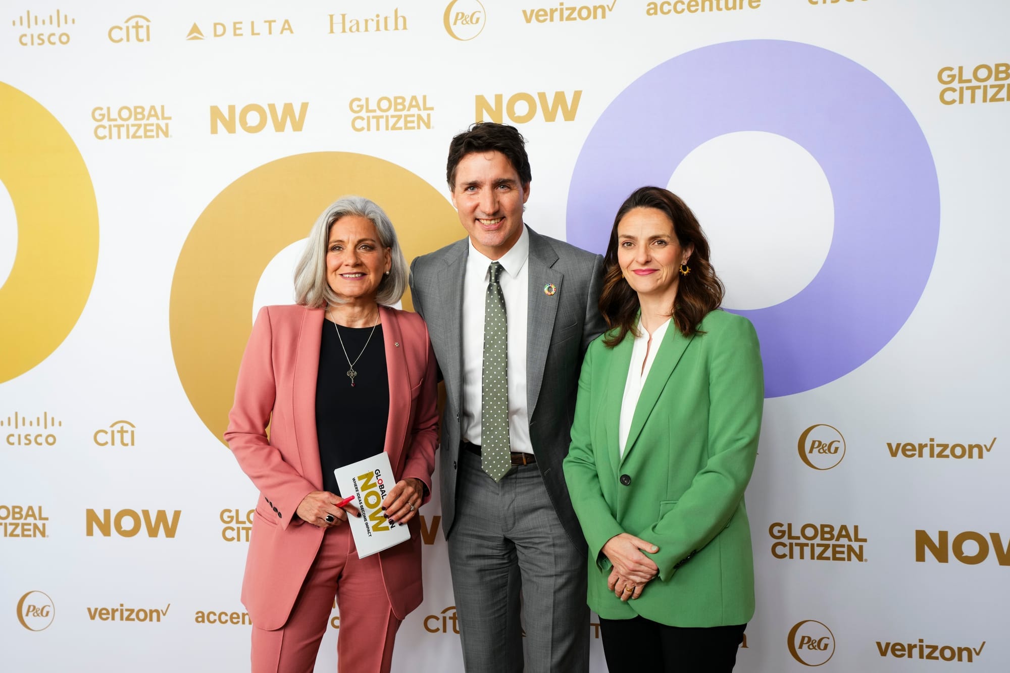 Former prime minister Justin Trudeau, former ambassador Jacqueline O'Neill and journalist Lisa LaFlamme pose for photos in New York on April 27, 2023. (The Canadian Press/Sean Kilpatrick)