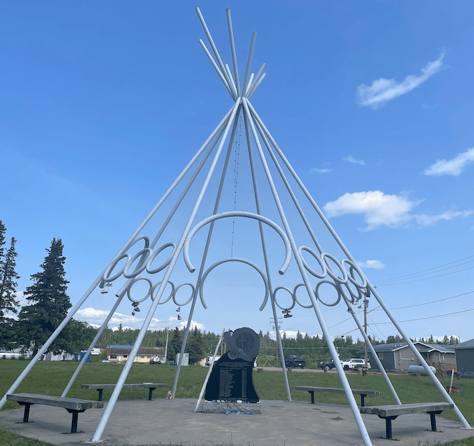 The metal poles of a teepee reach into the sky, as a memorial to the 19 boys who died in a fire at Beauval Indian Residential School in 1927.