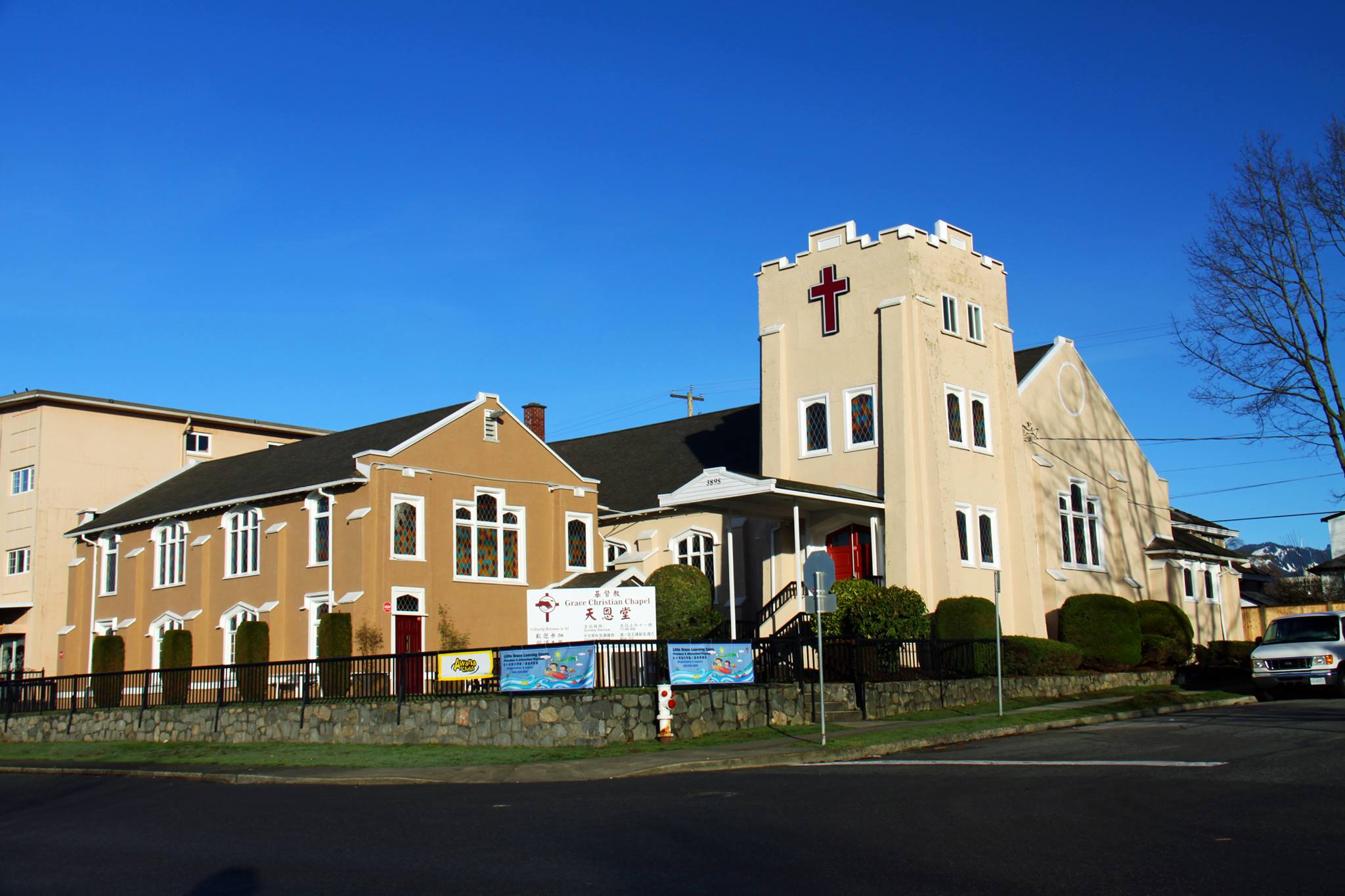 The Grace Christian Chapel complex is seen against a blue sky in Burnaby, B.C.